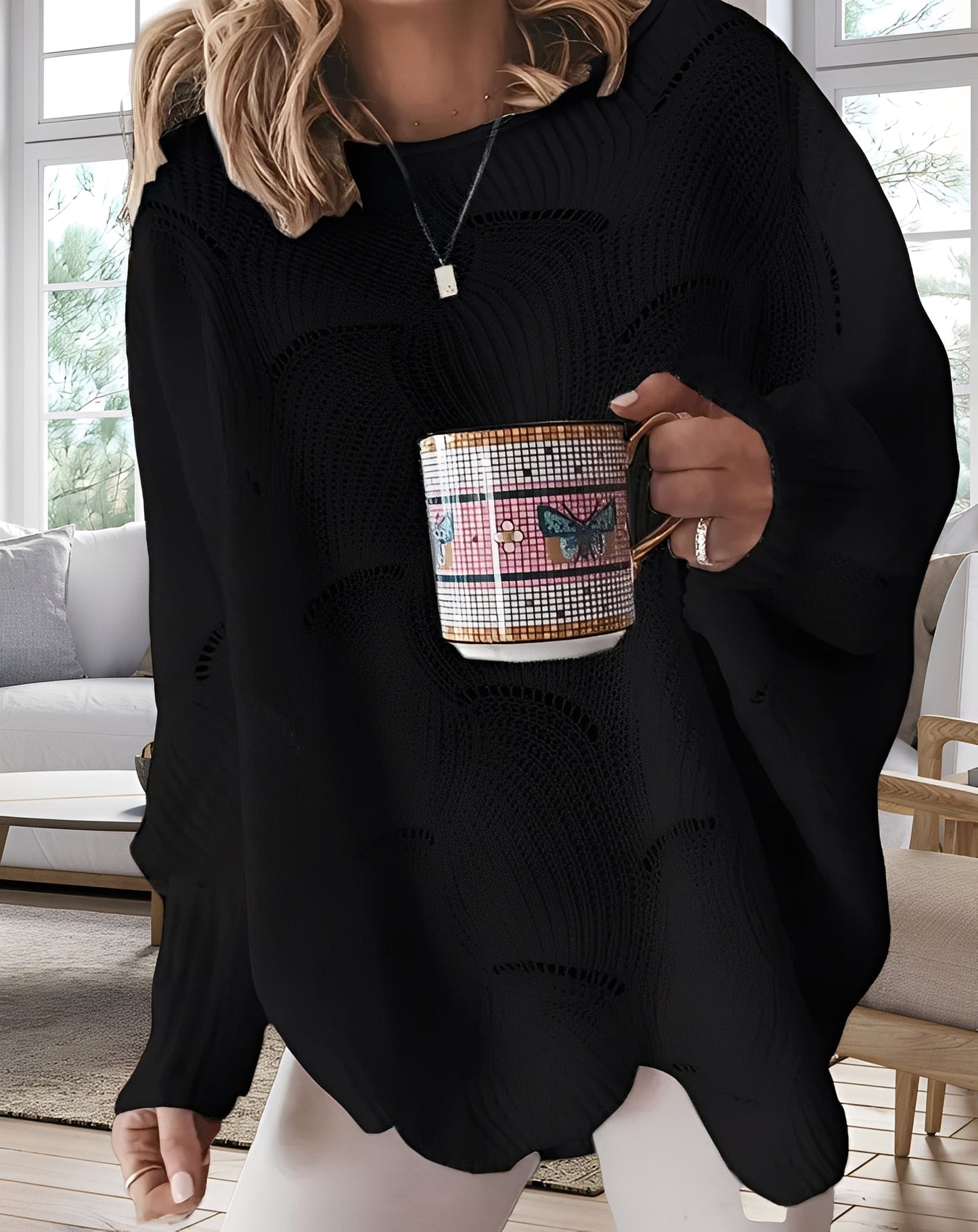 Kassandra - Stylowy, wycięty sweterek dla kobiet